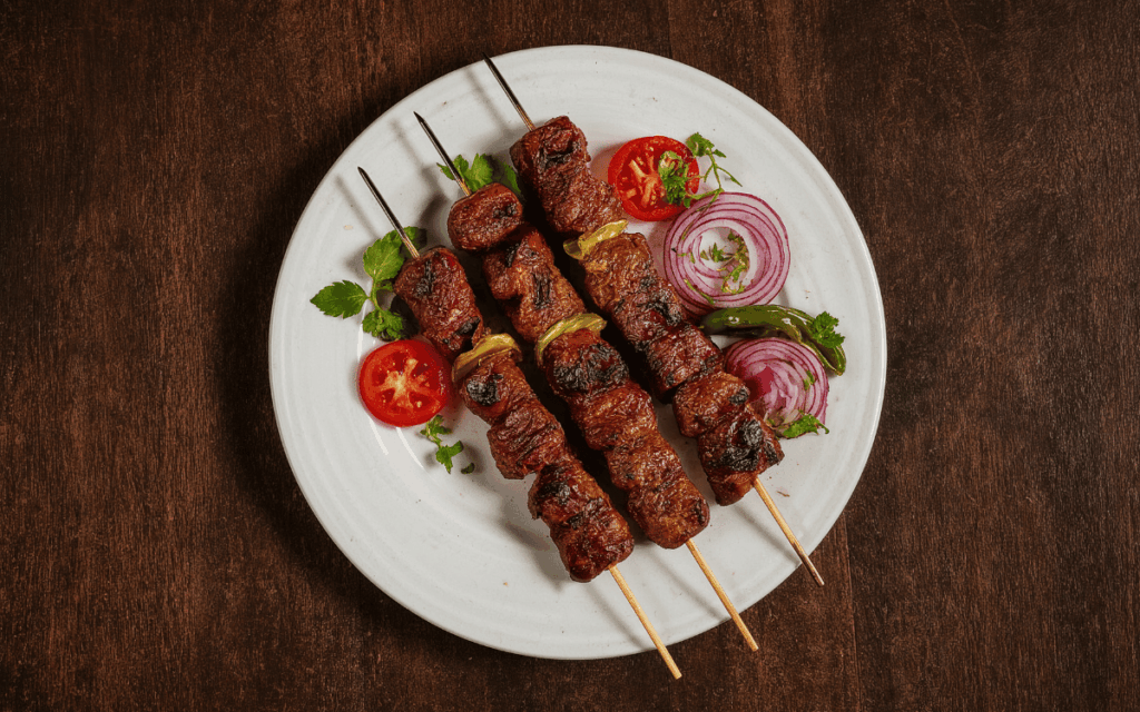 Ambiente acogedor del restaurante con carne a la brasa en Mollet del Vallès